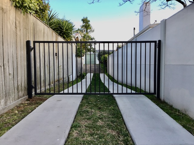 black metal bar swing driveway gate