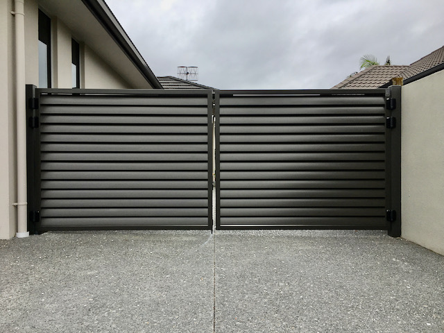 bi fold driveway gate for cars horizontal metal slats matte black